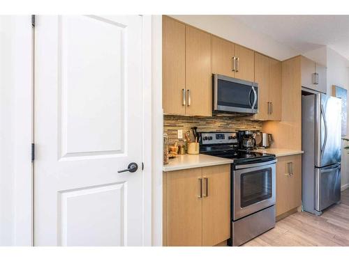 373 Walden Drive Se, Calgary, AB - Indoor Photo Showing Kitchen With Stainless Steel Kitchen