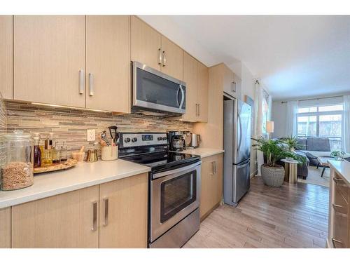 373 Walden Drive Se, Calgary, AB - Indoor Photo Showing Kitchen With Stainless Steel Kitchen