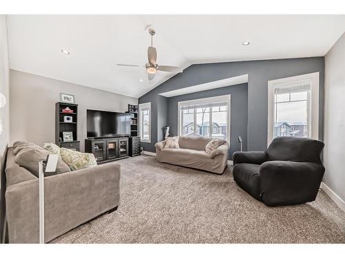 144 Baysprings Court Sw, Airdrie, AB - Indoor Photo Showing Living Room