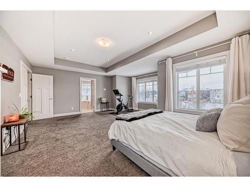 144 Baysprings Court Sw, Airdrie, AB - Indoor Photo Showing Bedroom