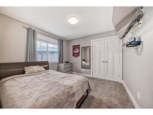 144 Baysprings Court Sw, Airdrie, AB - Indoor Photo Showing Bedroom