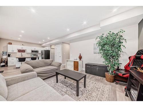 144 Baysprings Court Sw, Airdrie, AB - Indoor Photo Showing Living Room