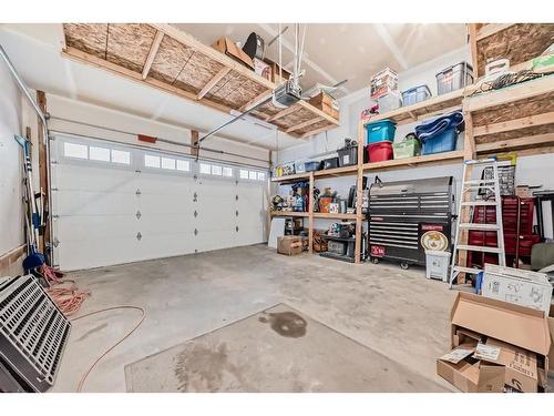 144 Baysprings Court Sw, Airdrie, AB - Indoor Photo Showing Garage