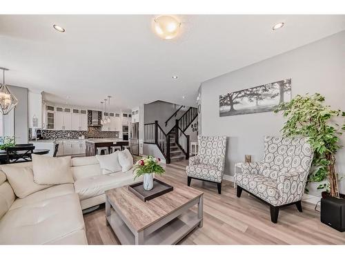 144 Baysprings Court Sw, Airdrie, AB - Indoor Photo Showing Living Room