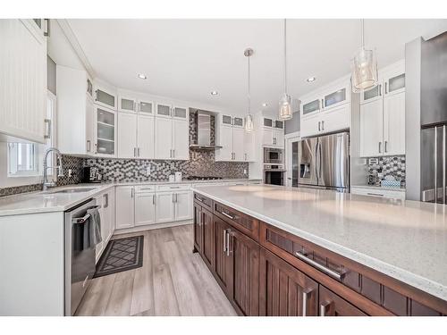 144 Baysprings Court Sw, Airdrie, AB - Indoor Photo Showing Kitchen With Upgraded Kitchen