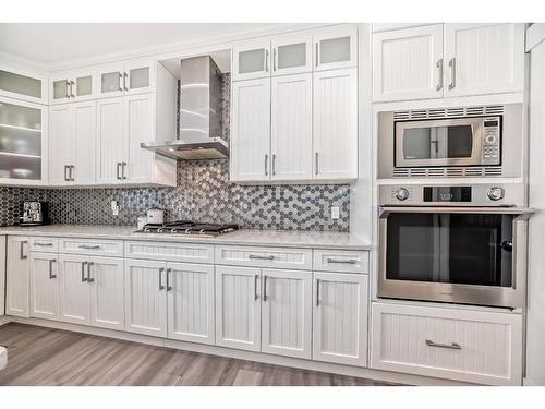 144 Baysprings Court Sw, Airdrie, AB - Indoor Photo Showing Kitchen