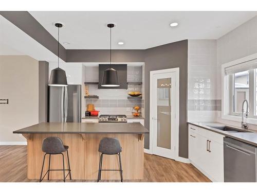 4-1918 32 Street Sw, Calgary, AB - Indoor Photo Showing Kitchen With Double Sink With Upgraded Kitchen