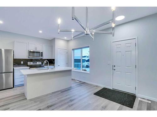 19 Marmot Way Nw, Calgary, AB - Indoor Photo Showing Kitchen