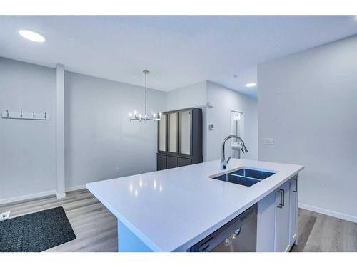 19 Marmot Way Nw, Calgary, AB - Indoor Photo Showing Kitchen With Double Sink