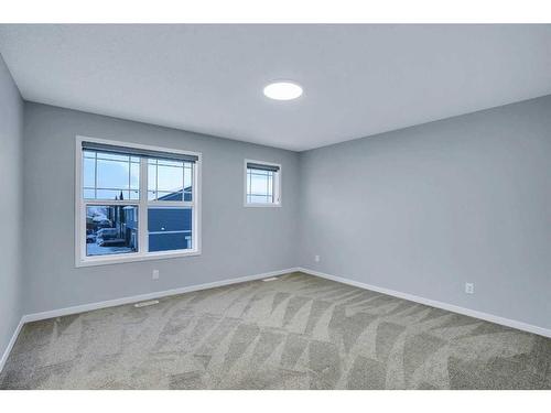 19 Marmot Way Nw, Calgary, AB - Indoor Photo Showing Other Room