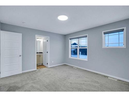 19 Marmot Way Nw, Calgary, AB - Indoor Photo Showing Other Room