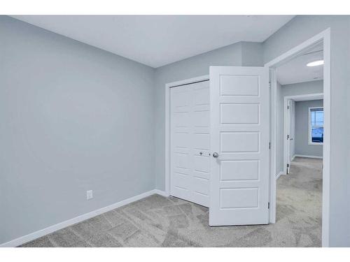 19 Marmot Way Nw, Calgary, AB - Indoor Photo Showing Other Room