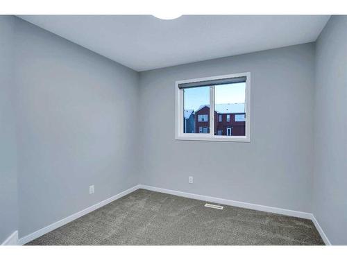 19 Marmot Way Nw, Calgary, AB - Indoor Photo Showing Other Room