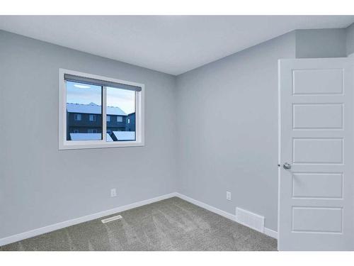 19 Marmot Way Nw, Calgary, AB - Indoor Photo Showing Other Room