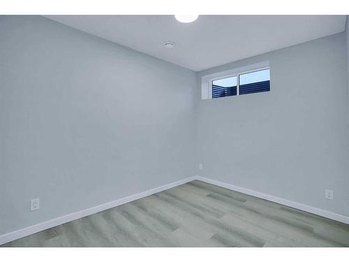 19 Marmot Way Nw, Calgary, AB - Indoor Photo Showing Other Room