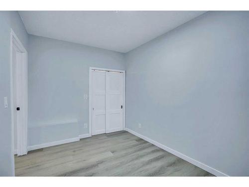 19 Marmot Way Nw, Calgary, AB - Indoor Photo Showing Other Room