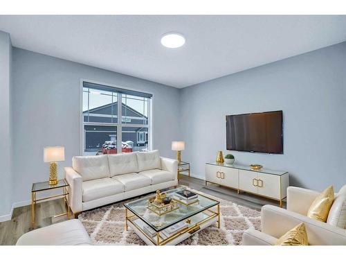 19 Marmot Way Nw, Calgary, AB - Indoor Photo Showing Living Room