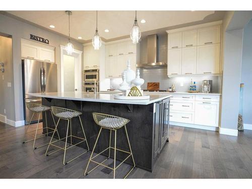 117 Aspenmere Bay, Chestermere, AB - Indoor Photo Showing Kitchen With Upgraded Kitchen