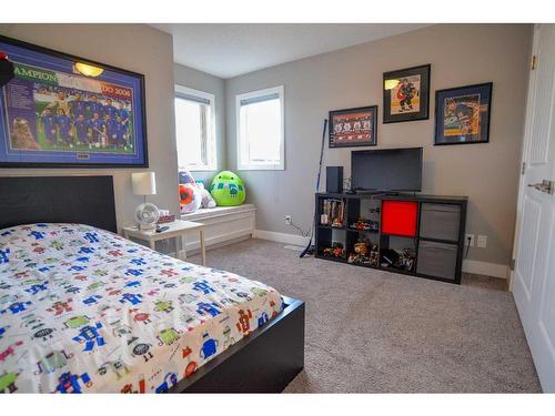 117 Aspenmere Bay, Chestermere, AB - Indoor Photo Showing Bedroom