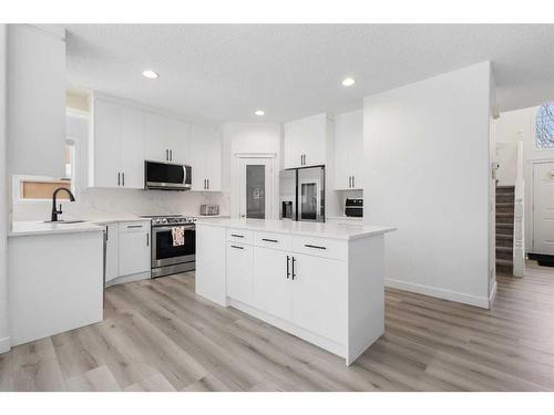 53 Strathlea Grove Sw, Calgary, AB - Indoor Photo Showing Kitchen With Stainless Steel Kitchen With Upgraded Kitchen