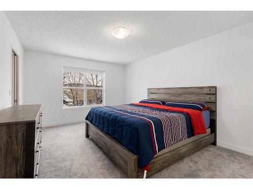 53 Strathlea Grove Sw, Calgary, AB - Indoor Photo Showing Bedroom