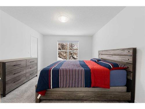 53 Strathlea Grove Sw, Calgary, AB - Indoor Photo Showing Bedroom