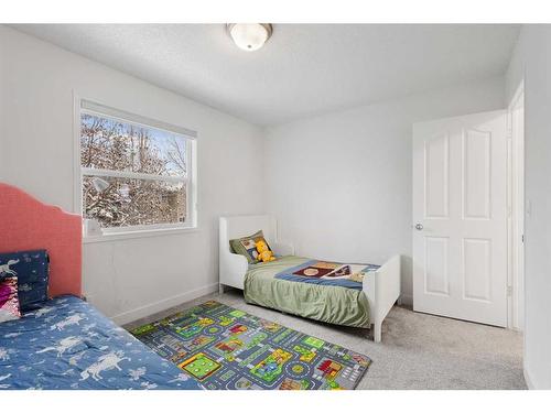 53 Strathlea Grove Sw, Calgary, AB - Indoor Photo Showing Bedroom