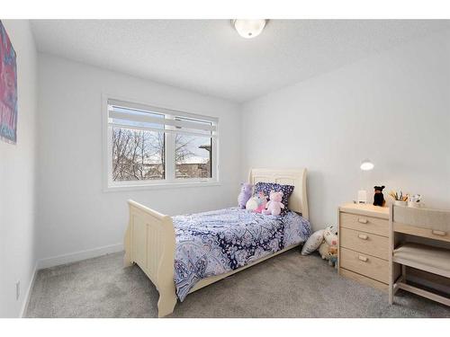 53 Strathlea Grove Sw, Calgary, AB - Indoor Photo Showing Bedroom