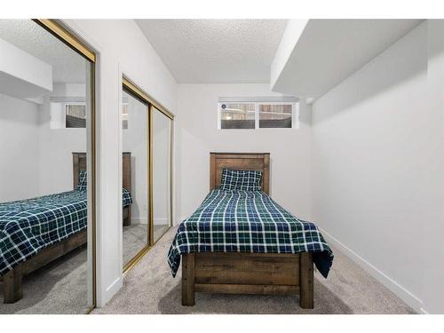 53 Strathlea Grove Sw, Calgary, AB - Indoor Photo Showing Bedroom