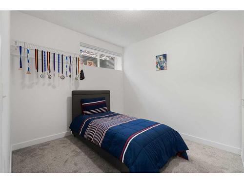 53 Strathlea Grove Sw, Calgary, AB - Indoor Photo Showing Bedroom