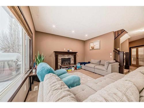 473 Marina Drive, Chestermere, AB - Indoor Photo Showing Living Room With Fireplace