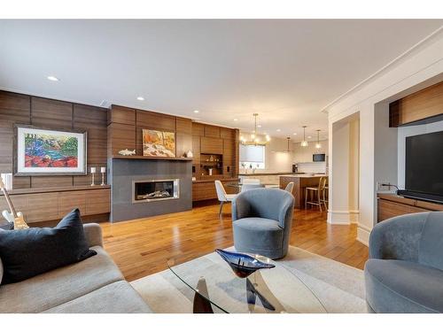 10-4907 8 Street Sw, Calgary, AB - Indoor Photo Showing Living Room With Fireplace