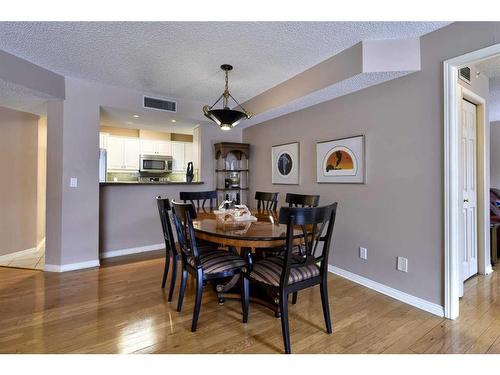 211-9449 19 Street Sw, Calgary, AB - Indoor Photo Showing Dining Room