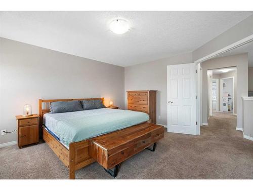 332 Whitecap Way, Chestermere, AB - Indoor Photo Showing Bedroom