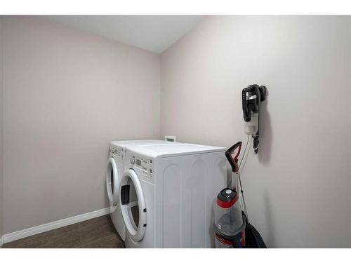 332 Whitecap Way, Chestermere, AB - Indoor Photo Showing Laundry Room