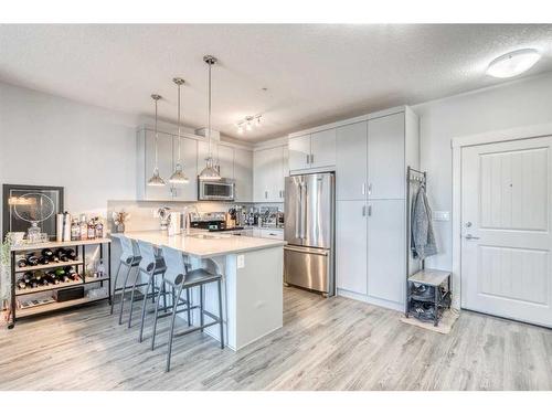 3312-522 Cranford Drive Se, Calgary, AB - Indoor Photo Showing Kitchen With Upgraded Kitchen