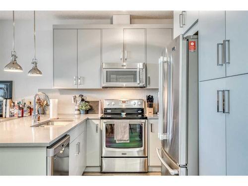 3312-522 Cranford Drive Se, Calgary, AB - Indoor Photo Showing Kitchen With Double Sink With Upgraded Kitchen