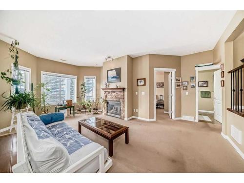 429 Rocky Vista Gardens Nw, Calgary, AB - Indoor Photo Showing Living Room With Fireplace