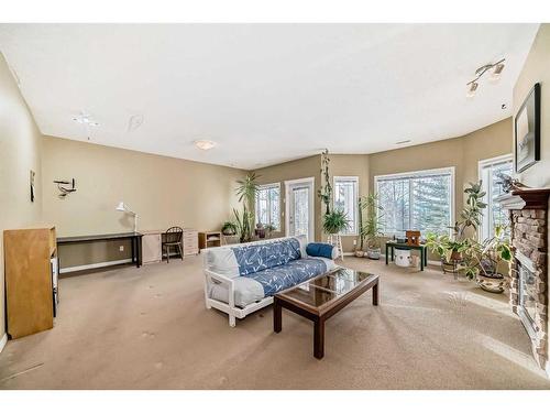 429 Rocky Vista Gardens Nw, Calgary, AB - Indoor Photo Showing Living Room With Fireplace