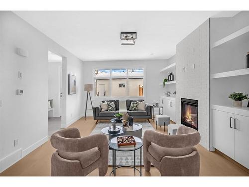 824 21 Avenue Nw, Calgary, AB - Indoor Photo Showing Living Room With Fireplace