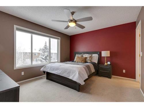 93 Cougarstone Place Sw, Calgary, AB - Indoor Photo Showing Bedroom