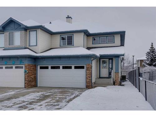 93 Cougarstone Place Sw, Calgary, AB - Outdoor With Facade