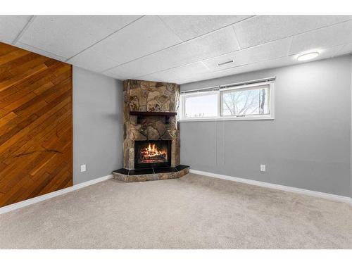 895 Pinecliff Drive Ne, Calgary, AB - Indoor With Fireplace