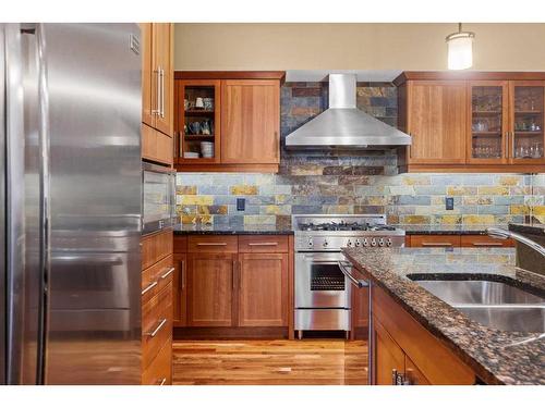 3-806 4Th Street, Canmore, AB - Indoor Photo Showing Kitchen With Double Sink