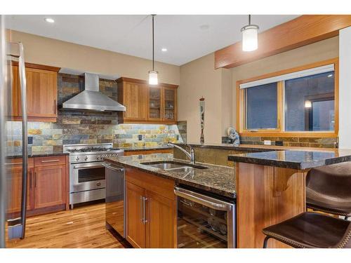 3-806 4Th Street, Canmore, AB - Indoor Photo Showing Kitchen With Double Sink