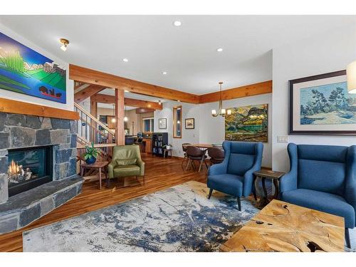 3-806 4Th Street, Canmore, AB - Indoor Photo Showing Living Room With Fireplace