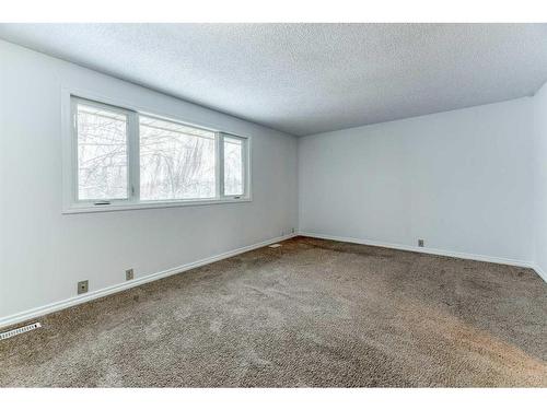 555 Woodpark Boulevard Sw, Calgary, AB - Indoor Photo Showing Other Room