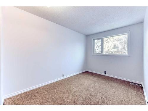 555 Woodpark Boulevard Sw, Calgary, AB - Indoor Photo Showing Other Room