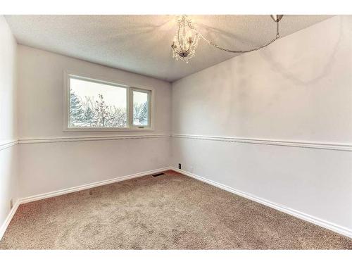 555 Woodpark Boulevard Sw, Calgary, AB - Indoor Photo Showing Other Room