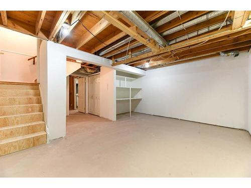 555 Woodpark Boulevard Sw, Calgary, AB - Indoor Photo Showing Basement